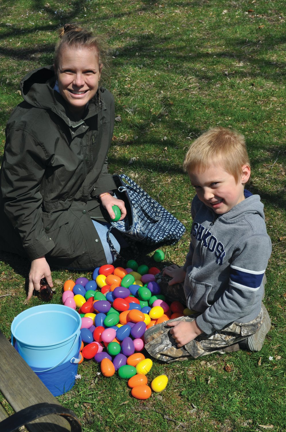 Max Lowe, 6, and his mother, Abbie Lowe, count their Easter eggs on the grounds of the General Lew Wallace Study & Museum Saturday. The hunt was sponsored by the Crawfordsville Parks and Recreation Department and Nucor Steel.